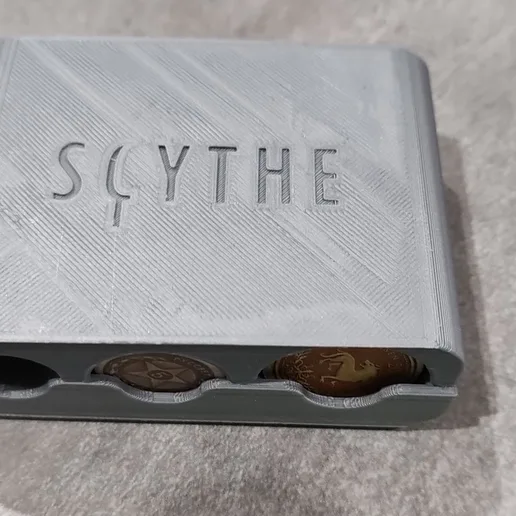 Scythe coin box