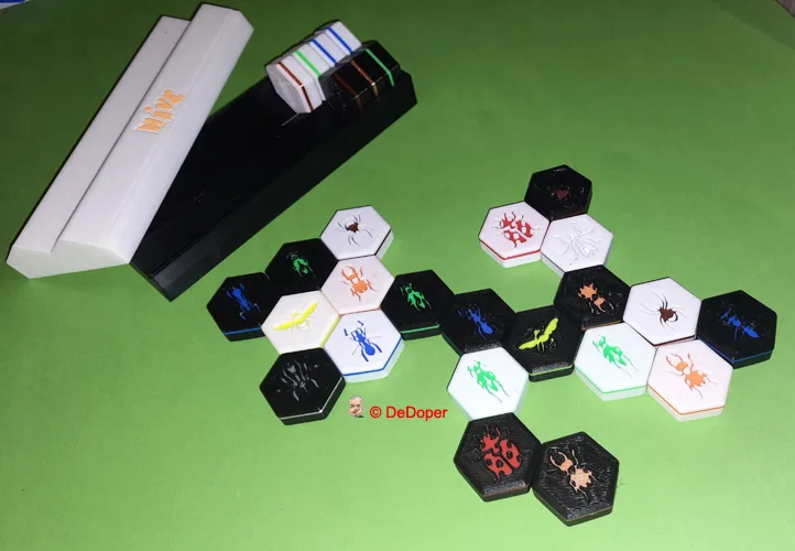 Hive game with expansions and storage box
