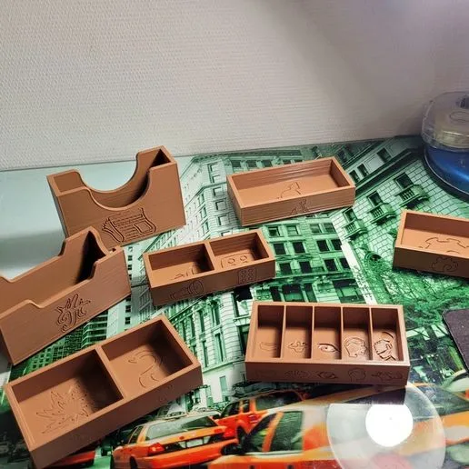 Arkham Horror Third Edition + Under Dark Waves boxes