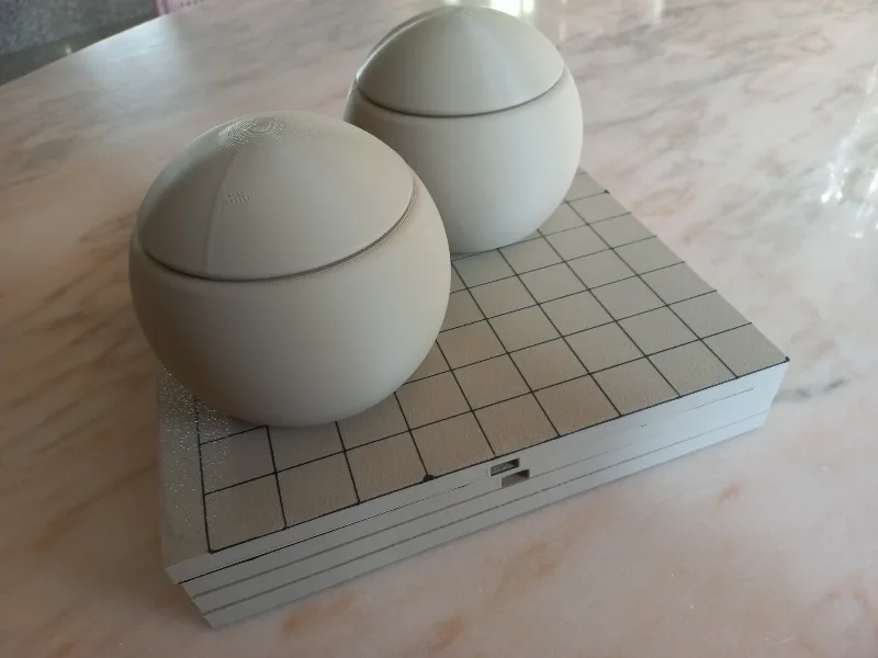 Go game bowls and stones