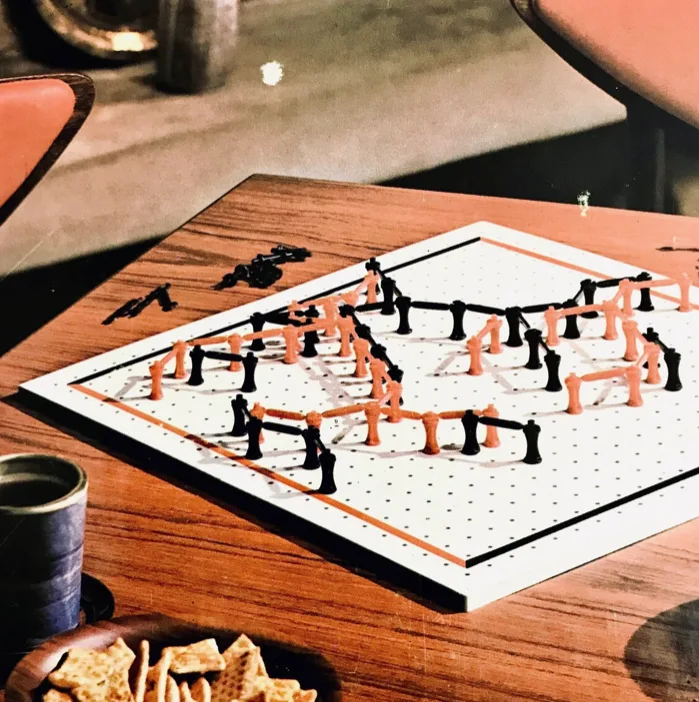 TwixT "Ingeneous New Strategy Game For Two" published 1962 by Avalon Hill