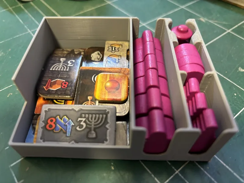 Golem player trays with a larger space for player tokens