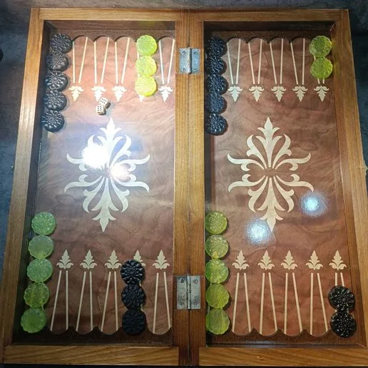 Backgammon piece