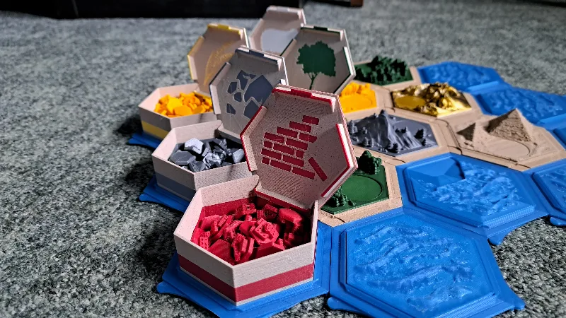 | Catan | Resource containers