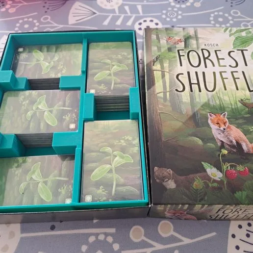 Forest Shuffle insert including expansions and sleeved cards