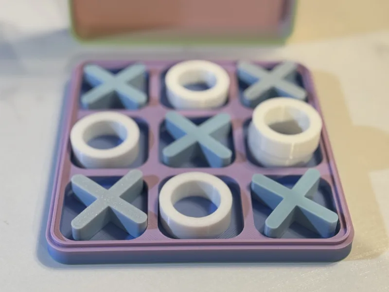 Tic-Tac-Toe game with storage container