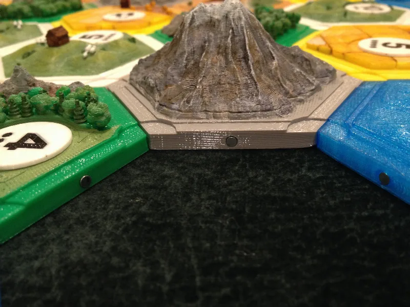Catan terrain tiles, modified for cylindrical magnets