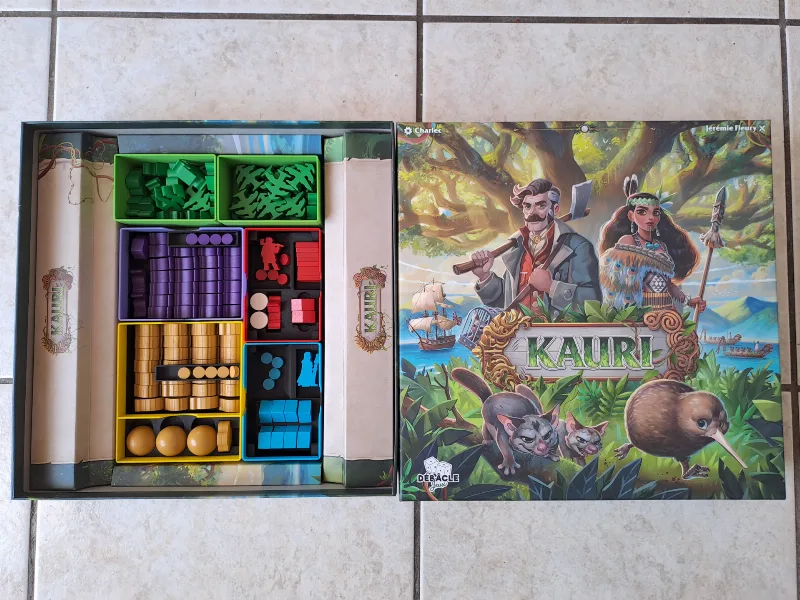 Storage box and tokens for the Kauri game