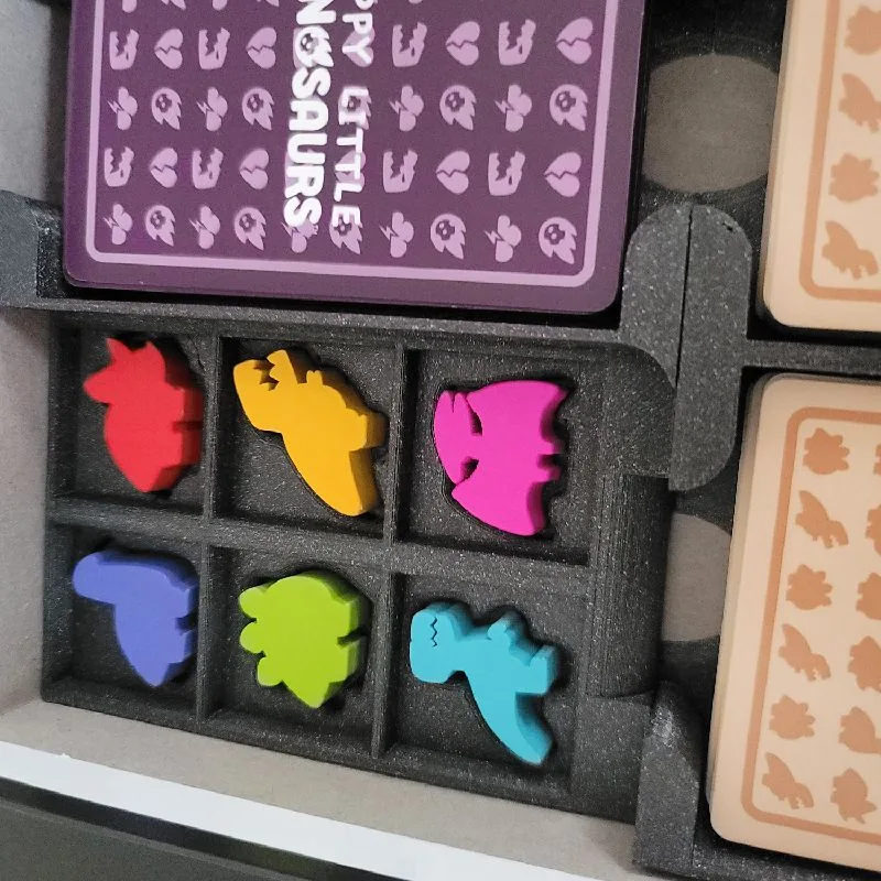 Happy Little Dinosaurs board game insert
