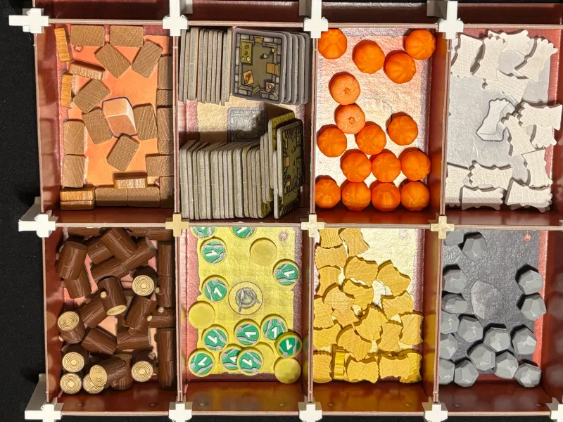 Agricola tokens (food, wood, stone, and veggie)