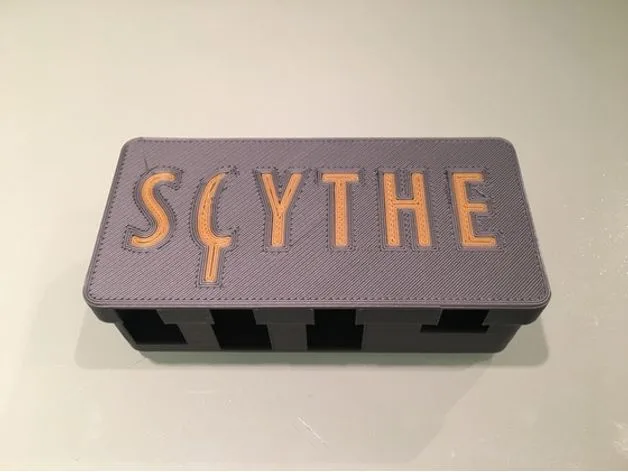 Scythe Coin Holder