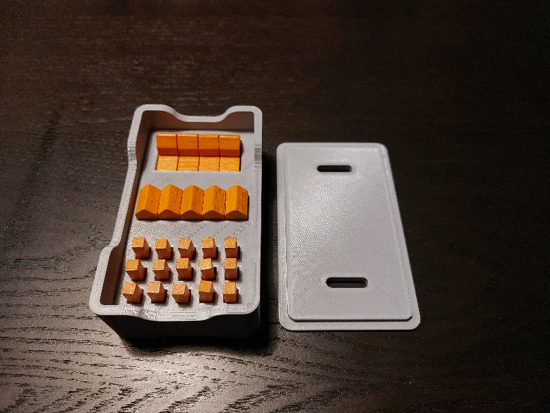 Catan Player pieces with lid for larger and smaller pieces