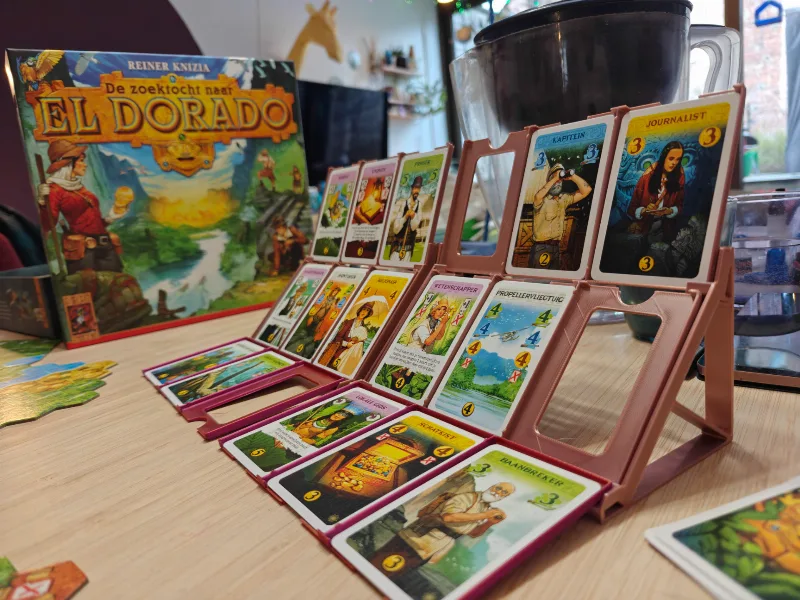 the quest for El Dorado card trays +market display