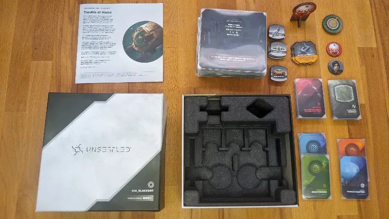 Unsettled - Blackout custom box for sleeved cards
