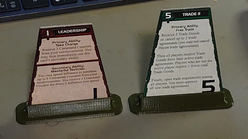 Twilight Imperium 3 / 4 strategy card holders, strait up and 15 degrees tilt.